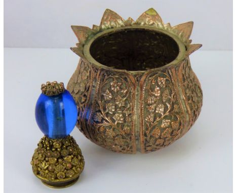 An early 20th century white metal small bowl with flared kettle lid, in the form of a tulip head, with vertical floral panels