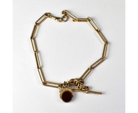 A Victorian 9ct rose gold watch chain with elongated links and central hoop, a swivel gold seal on chain with T-bar, suspende