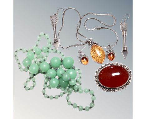 A Sterling silver mounted cabochon brooch, together with Sterling silver pendant with matching earrings, pair of white metal 