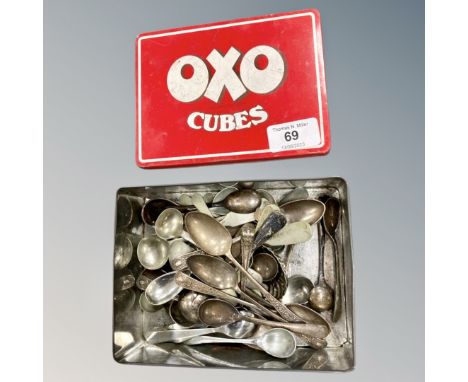 A Vintage OXO Cube tin, with lid, containing an interesting collection of forty three salt, mustard and caddy spoons.  (Q)  