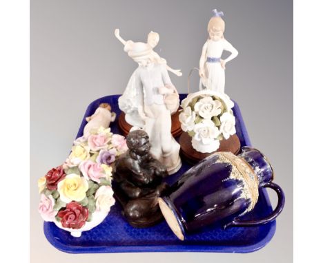 A tray of china flower posies, Royal Doulton jug, figures including Nao and Leonardo 