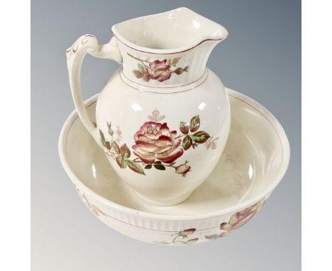 A transfer printed pottery wash jug and basin together with a Gent's black bowler hat by Dunn and co and a rattan stool 
