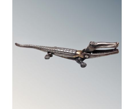 A 20th century novelty nut cracker in the form of a crocodile 