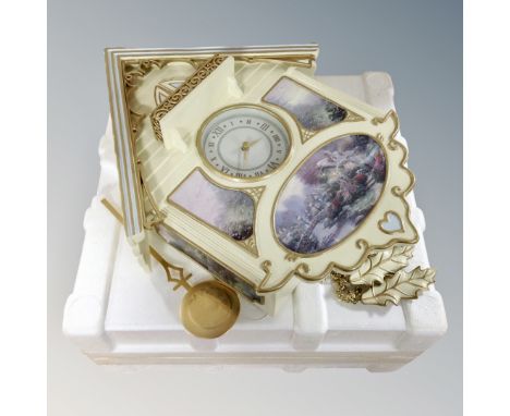 A Bradford Editions Thomas Kinkades lamplight bridge cuckoo clock 