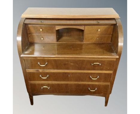 A continental cylinder bureau and a tile topped nest of tables