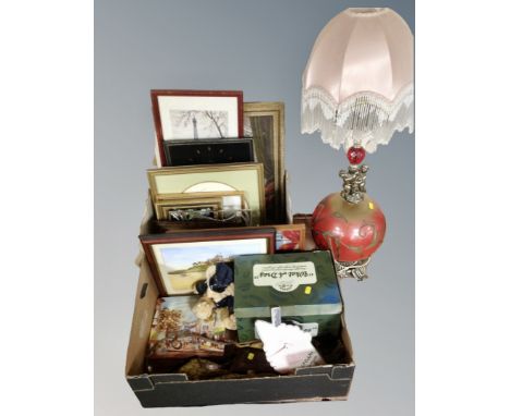 Two boxes of pictures, wall clocks, needlework panels, Ringtons ornaments, soft toy, ornate table lamp with tasseled shade 