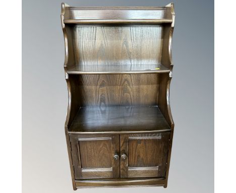An Ercol oak bookcase 
