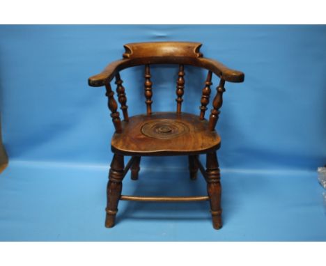 A CHILDS COMMODE CHAIR, in the style of a smokers bow chair