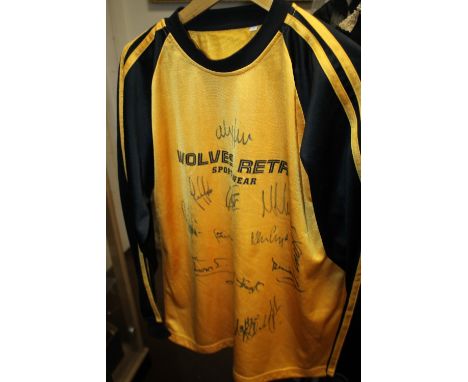 A SIGNED WOLVES FOOTBALL SHIRT TO INCLUDE SIGNATURES FOR MATT MURRAY, ETC.