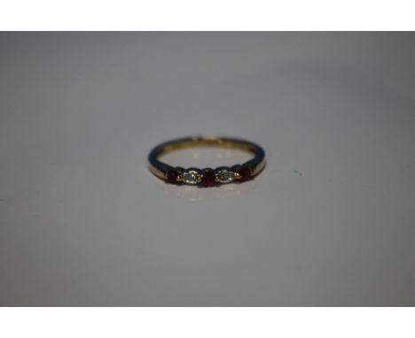 A 9 CT YELLOW GOLD FIVE STONE RUBY AND DIAMOND RING