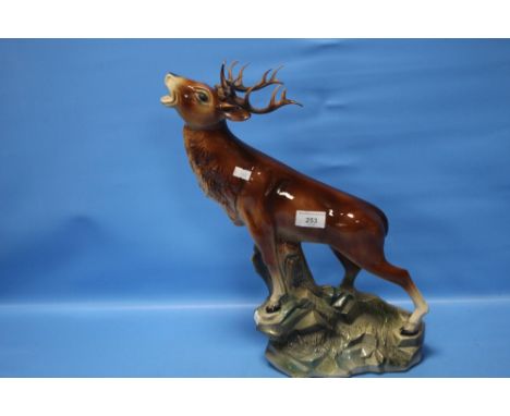 A CERAMIC STAG, APPROX H. 44 CMThere is a small loss to the tip of one antler point.  General craze to the glaze, otherwise n