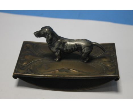 A WMF ART NOUVEAU STYLE DESK BLOTTER WITH DACHSUND FINIAL