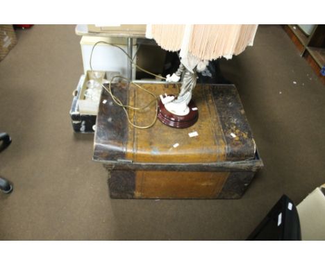 A TIN TRUNK AND CONTENTS TOGETHER WITH A FIGURATIVE LAMP