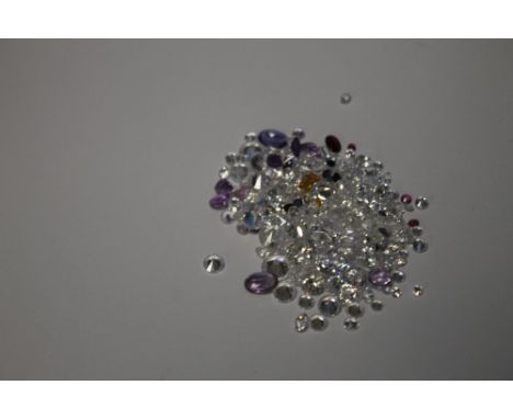 A BAG OF LOOSE MIXED STONES INCLUDING CUBIC ZIRCONIA, RUBY, SAPPHIRE, AMETHYST AND CITRINE, 93.8 CT