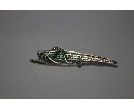 A LARGE SILVER PLIQUE-A-JOUR LOCUST BROOCH SET WITH CABOCHON, RUBY AND MARCASITE