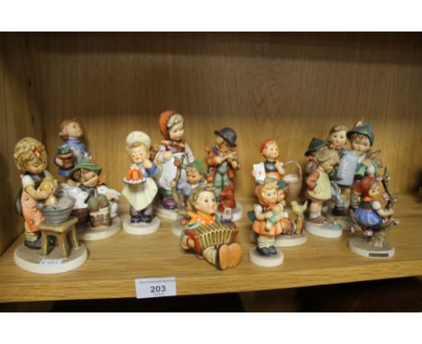 A COLLECTION OF HUMMEL FIGURES