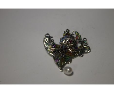 A LARGE SILVER PLIQUE-A-JOUR CLEOPATRA BROOCH / PENDANT SET WITH A SUSPENDED PEARL, AMETHYST, RUBIES AND MARCASITES