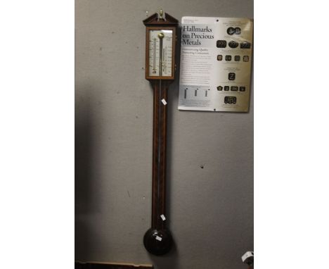 A STICK BAROMETER WITH NAME "A. COMITTI &amp; SON, LONDON"