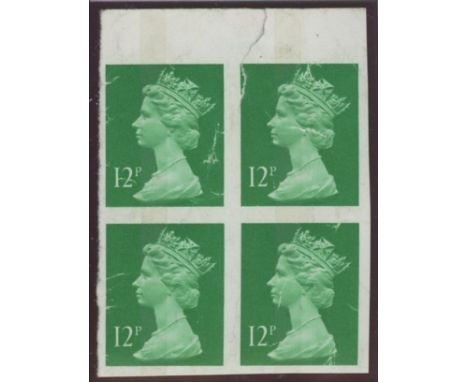 1985 12p bright emerald top marginal block of 4 Imperforate. U/M but with tear in top right stamp &amp; many creases. SG X896