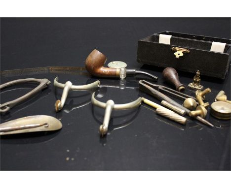 A Mixed lot, shoehorn hook, tuning fork, glass and wooden pipe with thistle emblem, steel spurs, compass etc