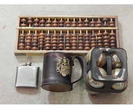 Boules, Abacus, Ornamental leather tankard, hip flask: 4 items in all. 