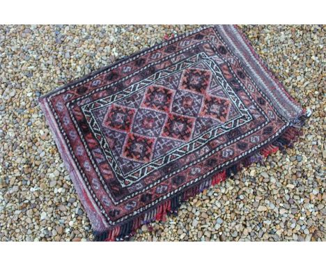 A late 19th century afghan Beluch bolsite, cushion cover / cargo bag in wool;