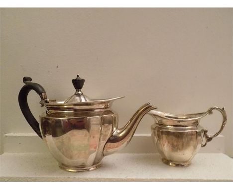 Early Art Deco - first quarter 20th Century Silver Teapot and milk jug, J.R in oval, John Round and Son Ltd, Sheffield, date 