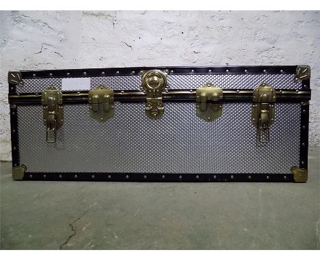 Modern polished metal trunk.