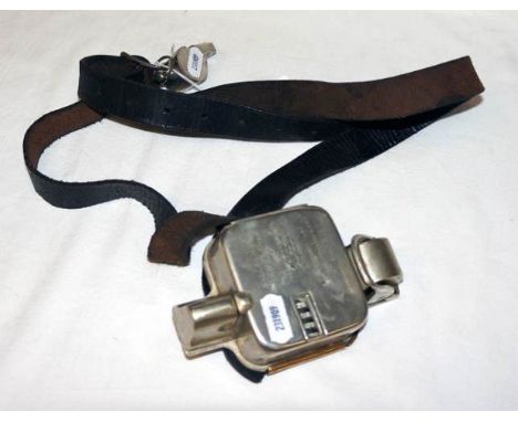 Vintage ticket printer by Williamson on leather strap with whistle