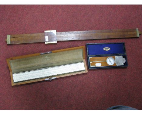 A Nagretti and Zambra Folding Measuring Rule, with built in compass - cases; slide rules incl. Castell and Dolland makers. (3