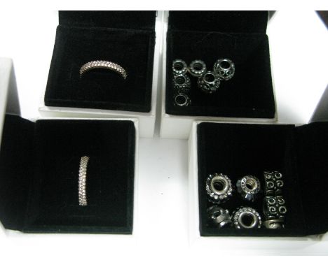 Pandora; Two Modern Dress Rings, allover claw set highlights, stamped "Pandora Ale R 56", boxed, together with a selection of