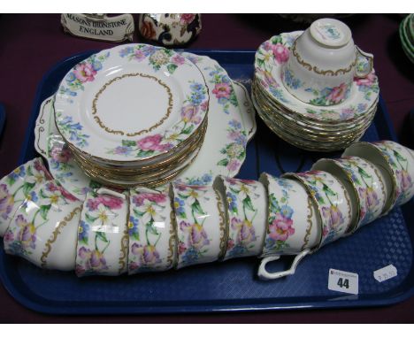 A Crown Staffordshire China Tea Service, in the 'Brendon' pattern, comprising bread and butter plate, twelve tea plates, elev