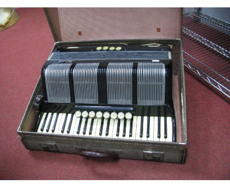 A Scandalli Piano Accordion. 120 buttons - cased.