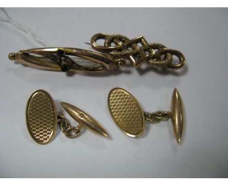 A Pair of 9ct Gold Gent's Cufflinks, engine turned oval panel, to chain suspension, a 9ct gold bar brooch, of openwork Celtic
