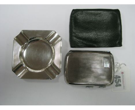 A Hallmarked Silver Cigarette Case, (marks rubbed) engine turned and initialled "AJE"; together with a hallmarked silver asht