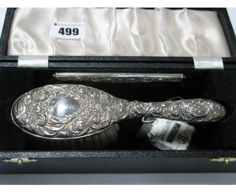 Silver Backed Embossed Hair Brush and Comb, in fitted case.