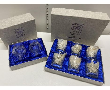 A boxed Edinburgh crystal whiskey tumbler set and two boxed Edinburgh crystal brandy balloons 