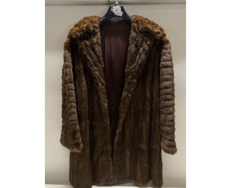 A ladies vintage fur coat 