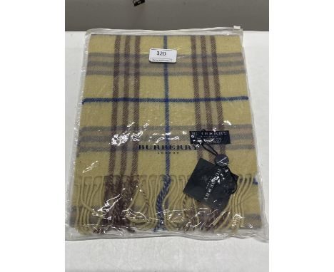 A new with tags Burberry 100% lambs wool yellow long scarf 120 x 23cm 