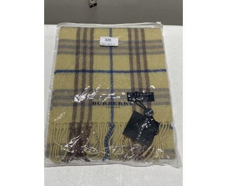 A new with tags Burberry 100% lambs wool yellow long scarf 120 x 23cm 