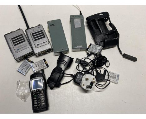 A job lot of assorted vintage telephones and police radios (untested) 