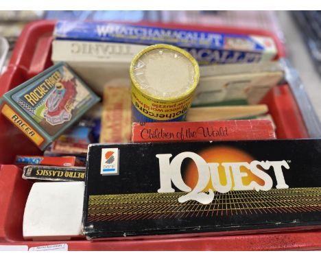 A boxed full of vintage board games and other toys etc, shipping unavailable