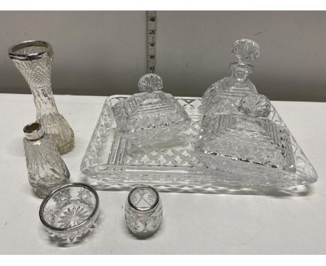 A vintage glass dressing table set including silver topped items 