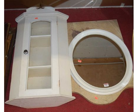 A modern white painted oval wall mirror, modern single gate fold screen, and a painted hanging corner cabinet (3)