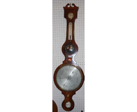 An early 19th century mahogany and ebony strung four dial wheel barometer, the silvered scale signed Boffi, Hastings