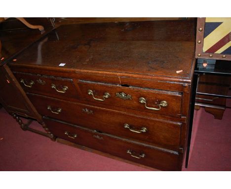 An early 19th century provincial oak chest of two short over two long graduated drawers, width 109cmCondition report: One spl