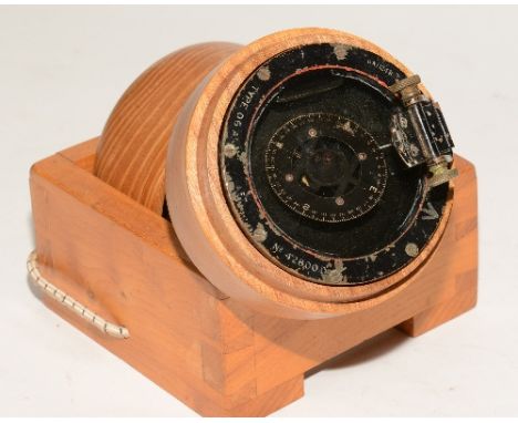 A military World War II handheld 'Bomber' compass, held within wooden mallet and stand, no 42800D, GA/1248, compass 9.5cm dia