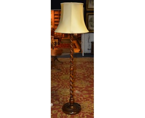 A spiral column floor lamp, with shade, 138cm high