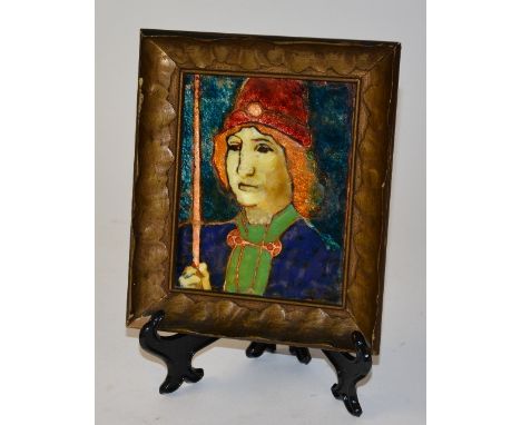 A late 19th century enamel plaque on copper, depicting a Continental male wearing red hat and blue jacket with green sash hol