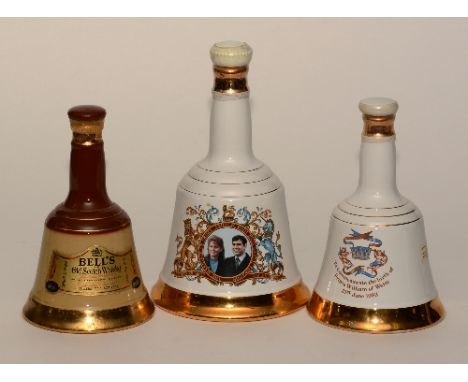 Three Wade Bell's scotch whisky decanters with contents, 20 & 25cm high (3)